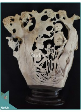 A Lovely Couple'S Skull Bone Carving Under The Tree