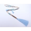 Long String Of Jewels And Stone Tassel Necklace